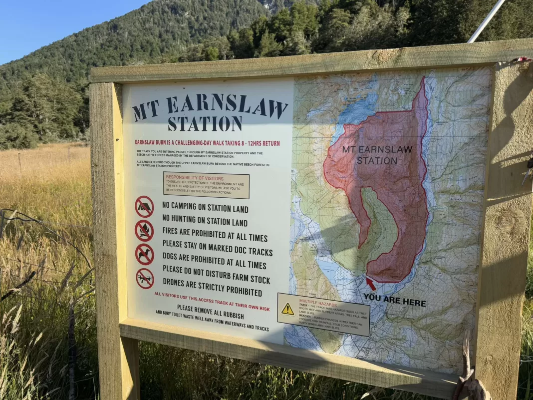 Sign at the start of the Earnslaw Burn track showing where people are allowed to camp