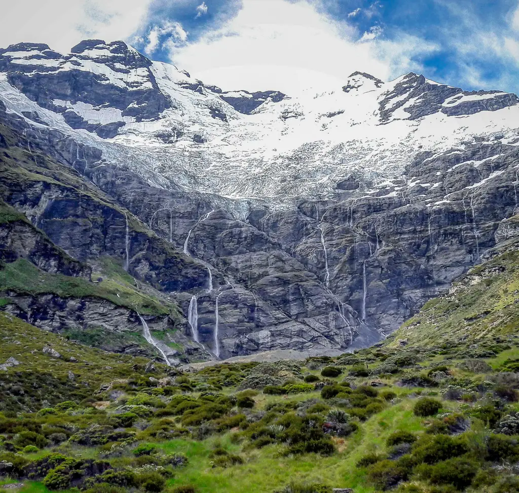 View of hanging glaciers and waterfalls at the top of Earnslaw Burn