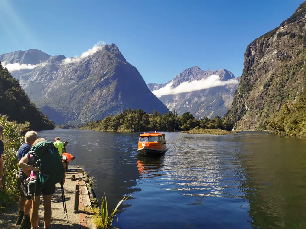 Water taxi arriving at Sandfly Point at the end of the Milford Track in Fiordland National Park
