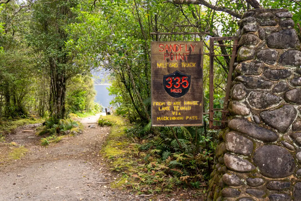 Sign marking the end of the Milford Track at Sandfly Point
