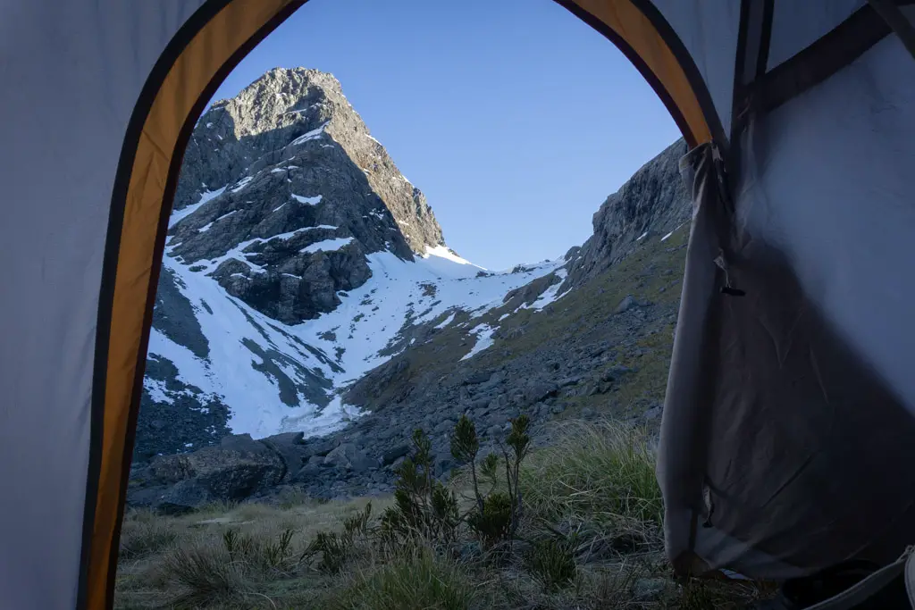 Emily Pass seen from a tent at sunrise