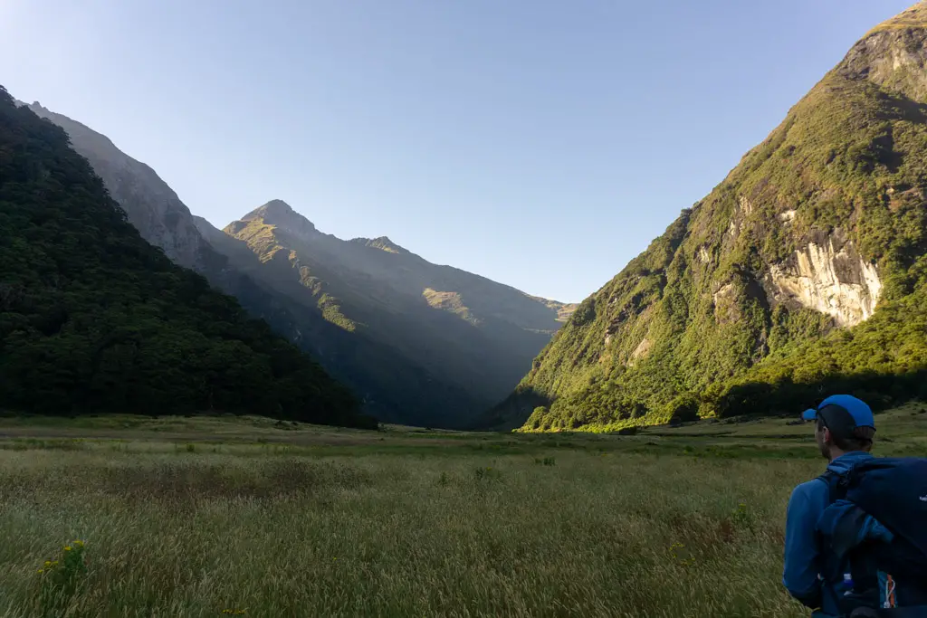 Man looking at Siberia Valley on the Wilkin-Young Circuit in the dawn light