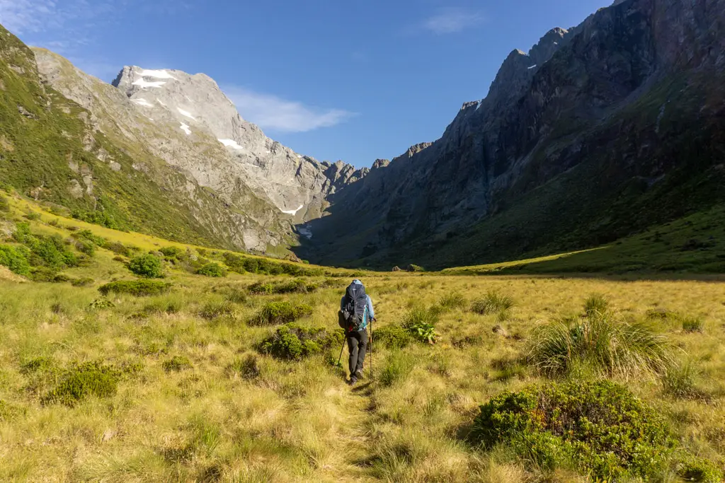 Man walking through the Young Basin towards Gillespie Pass on the Wilkin-Young Circuit