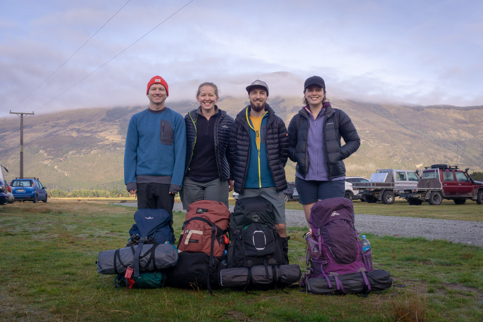 Four clean and motivated trampers with packs before heading to the Earnslaw Burn Track