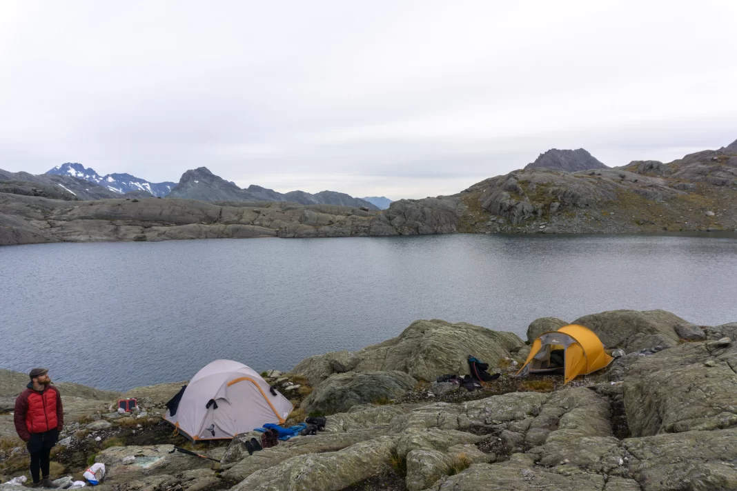 Tents set up by a tarn next to Lake Nerine