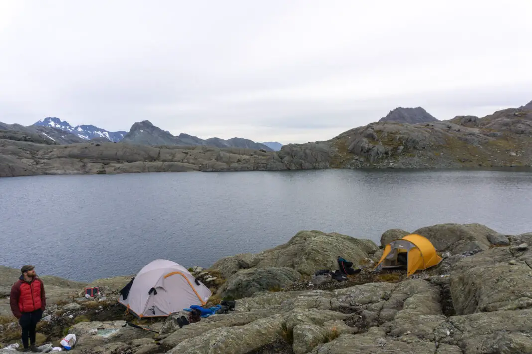 Tents set up by a tarn next to Lake Nerine