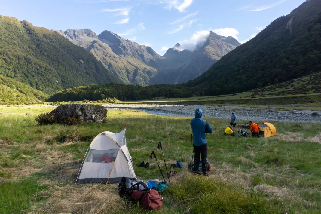 Trampers setting up camp in the North Branch of the Routeburn
