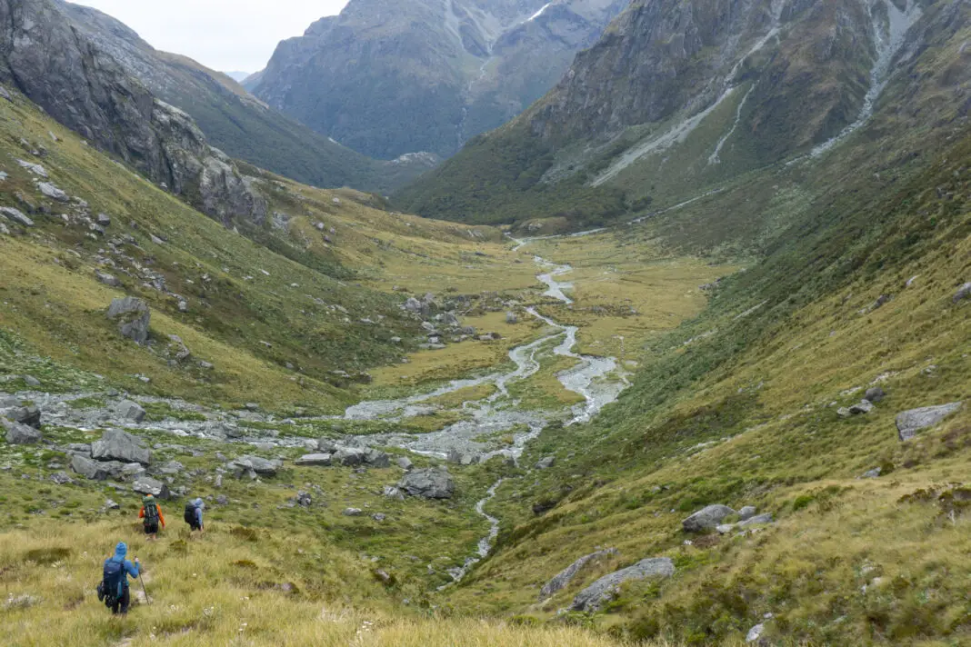 Trampers walking down Park Pass towards Theatre Flat