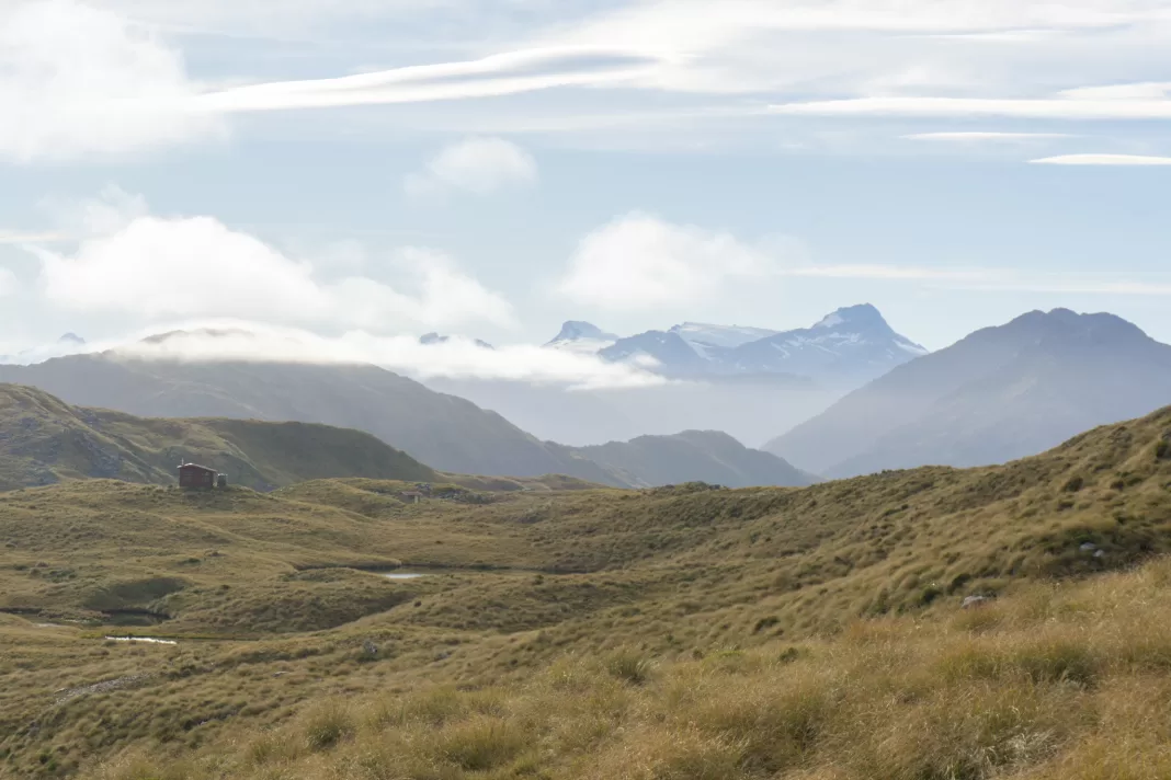 Maketake Hut with mountains behind