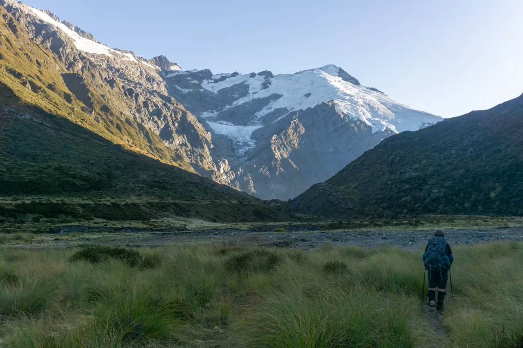 Woman walking up the Dart Track to Dart Glacier