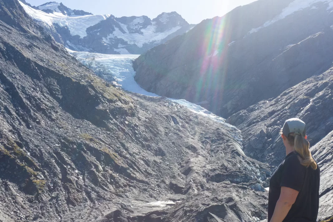 Woman looking at the Dart Glacier